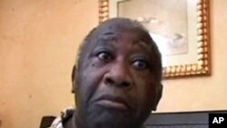 Ivory Coast's Laurent Gbagbo after being arrested, April 11, 2011