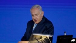 Israeli Prime Minister Benjamin Netanyahu gives an address at the London Stock Exchange in the City of London, Friday, Nov. 3, 2017. 