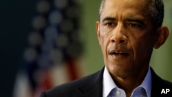President Barack Obama arrives to speak in Edgartown, Mass., Aug. 20, 2014, about the killing of American journalist James Foley by militants with the Islamic State extremist group. 