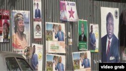 Campaign signs of presidential candidates can be seen in Ouagadougou, Burkina Faso, for the upcoming election.