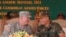 លោក​ឧត្តមសេនីយ៍​ ហ៊ុន ម៉ាណែត កូន​ប្រុស​របស់​លោក​នាយករដ្ឋមន្ត្រី​ ហ៊ុន សែន ពិភាក្សា​ជាមួយ​លោក​ឧត្តមសេនីយ៍ John Goodale របស់​សហរដ្ឋ​អាមេរិក​​​ក្នុង​អំឡុង​សមយុទ្ធ​យោធា «ឆ្មាំ​អង្គរ» ​នៅ ខេត្ត​កំពង់​ស្ពឺ​កាល​ពី​ថ្ងៃ​ទី​​២១ ខែ​មេសា ឆ្នាំ​២០១៤។