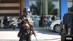 Iraqi Special Forces, Federal Police, Iraqi Army and Popular Mobilization Units were seen patrolling Kirkuk the day after they took the city on Oct. 17, 2017 in Kirkuk, Iraq. (H.Murdock/VOA)
