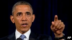 President Barack Obama gestures while speaking in San Jose, California, June 7, 2013. The president defended his government's secret surveillance, saying Congress has repeatedly authorized the collection of America's phone records and U.S. internet use.
