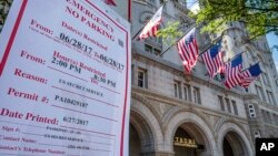 Emergency no parking signs are posted in front of the Trump International Hotel in Washington, June 28, 2017. 