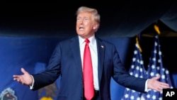 FILE - Republican presidential candidate former President Donald Trump arrives to speak at a campaign rally, July 31, 2024, in Harrisburg, Pa.