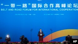 FILE - Chinese President Xi Jinping delivers his speech during the opening ceremony of the Belt and Road Forum the China National Convention Center in Beijing Sunday, May 14, 2017. (AP Photo/Alexander Zemlianichenko)