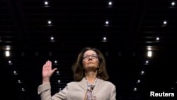 FILE - CIA director nominee and acting CIA Director Gina Haspel is sworn in to testify at her Senate Intelligence Committee confirmation hearing on Capitol Hill in Washington, May 9, 2018.