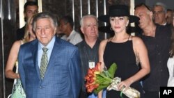 Singers Tony Bennett (L) and Lady Gaga are seen at the Empire State Building in honor of Bennett's 90th birthday, Aug. 3, 2016, in New York.