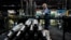 FILE - A steelworker moves an artillery projectile during the manufacturing process at the Scranton Army Ammunition Plant in Scranton, Pennsylvania, on April 13, 2023. The U.S. Defense Department said last week that some weapons deliveries to Ukraine will take months to complete.