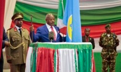 FILE - Burundi's President Pierre Nkurunziza is sworn in for a third term at a ceremony in the parliament in Bujumbura, Aug. 20, 2015.