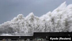 High waves triggered by Typhoon Jebi are seen at a fishing port in Aki, Kochi Prefecture, western Japan, in this photo taken by Kyodo, Sept. 4, 2018.