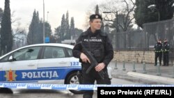 Police block off the area around the U.S. Embassy building in Podgorica after a grenade attack on the facility, Feb. 22, 2018.