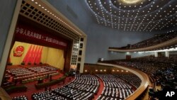 Chinese Premier Li Keqiang delivers a work report at the opening session of the annual National People's Congress at the Great Hall of the People in Beijing, March 5, 2016. 