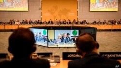 Participants attend a conference at the Organization for Economic Cooperation and Development in Paris, April 26, 2018.