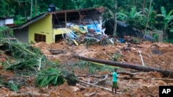 Mud and slush cover the slope at the site of a landslide in Kiribathgala, in Ratnapura district, Sri Lanka, May 29, 2017.