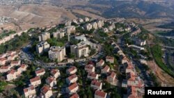Foto udara permukiman Yahudi Maale Adumim di Tepi Barat, wilayah Palestina yang diduduki Israel (29/6). 