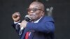 Former South African President Jacob Zuma, addresses supporters outside the High Court in Pietermaritzburg, South Africa, Wednesday May 26, 2021 where he faces charges of corruption. Zuma pleaded not guilty to corruption, racketeering, fraud, tax…