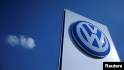 FILE - A Volkswagen logo is pictured at a VW factory in Wrzesnia, Poland, Sept. 9, 2016. 