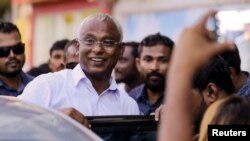 Maldivian president-elect Ibrahim Mohamed Solih arrives at an event with supporters in Male, Sept. 24, 2018. 