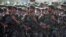 FILE - Members of Iran's Revolutionary Guards march during a military parade to commemorate the 1980-88 Iran-Iraq war in Tehran Sept. 22, 2007.