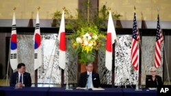 U.S. Deputy Secretary of State Wendy Sherman, right, South Korean First Vice Foreign Minister Choi Jong Kun, left, and Japanese Vice-Minister for Foreign Affairs Takeo Mori attend a press conference at the Iikura Guesthouse in Tokyo, July 21, 2021.