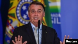 Presiden Jair Bolsonaro di Istana Planalto Brasilia, Brazil, 24 Februari 2021. (Foto: dok).