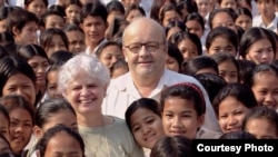 Christian and Marie-France des Pallieres, PSE founders, took a picture with children of Cambodia at Pour un Sourire d’Enfant (PSE) also known as “For a Child’s Smile.” (Courtesy of PSE)