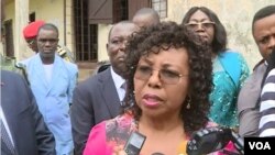Cameroon's minister of secondary education, Nalova Lyonga, speaks to the media after encouraging protesting teachers to return to school, in Buea, Cameroon, July 17, 2019. (Moki Kindzeka/VOA)