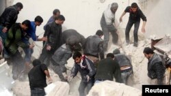 Halabda raketa hujumidan keyingi holat. 