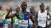 Le Kenyan Elijah Motonei Manangoi célèbre sa victoire au 1500m masculin lors de la compétition de la Diamond League de l'IAAF à Doha le 3 mai 2019.