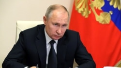 President Putin chairs a joint meeting of the country's State Council and the Council for Strategic Development and National Projects via a video conference at Novo-Ogaryovo state residence, Dec. 23, 2020. (Sputnik/Mikhail Klimentyev/Kremlin via Reuters)