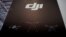 A DJI logo is seen at a security exhibition in Shanghai, China May 24, 2019. 