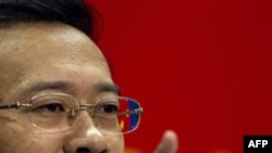 Dana Vollmer of the U.S. reacts after winning the women's 100m butterfly final during the London 2012 Olympic Games at the Aquatics Centre July 29, 2012. Vollmer set a world record with a timing of 55.98 seconds.