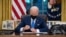 US President Joe Biden signs executive orders related to immigration 