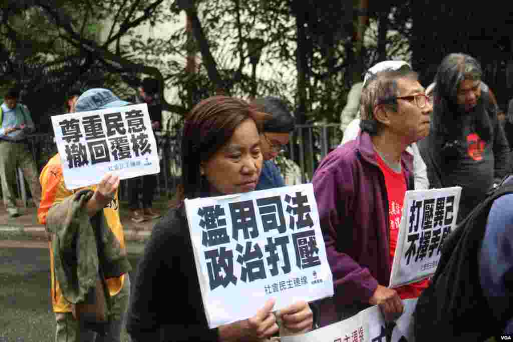 泛民政党游行至礼宾府抗议司法覆核民选议员(海彦拍摄)