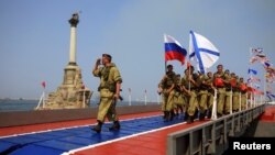 Germany&#39;s Eric Frenzel soars through the air during the ski jumping portion of the Nordic Combined, at the Nordic Ski World Championships in Innsbruck, Austria.