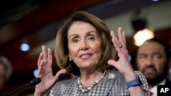 FILE - House Minority Leader Nancy Pelosi of California speaks to reporters on Capitol Hill in Washington.