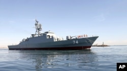 FILE - In this photo provided Dec. 1, 2018, by the Iranian Army, the Iranian destroyer Sahand sails in Persian Gulf waters, in Bandar Abbas, Iran.