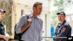 Russian opposition leader Alexei Navalny arrives at court after his arrest during a recent protest in Moscow, Russia, May 15, 2018. Moscow's Tverskoy District Court sentenced Navalny to 30 days in jail for staging an unsanctioned protest in the Russian capital earlier this month.