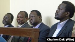 Left to right: former Security Minister Oyay Deng Ajak, former SPLM Secretary General Pagan Amum, former Deputy Defense Minister Majok D'Agot Atem, former envoy of Southern Sudan government to the US Ezekiel Lol Gatkuoth, in court.