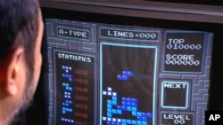 FILE - In this June 1990, photo, Tetris, an addictive brain-teasing video game, is shown as played on the Nintendo Entertainment System in New York.