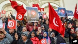 Maandamano ya kumpinga Rais wa Tunisia Kais Saied, mjini Tunis, Machi 5, 2023. Picha ya AP