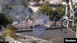 Pogled na oštećeni ruski brod nakon ukrajinskog napada na Sevastopolj, Krim, 13. septembra 2023. godine. (Foto: Reuters/Telegram/Crimean Wind)