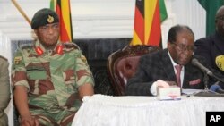 Zimbabwean President Robert Mugabe delivers his speech during a live broadcast at State House in Harare, Nov, 19, 2017. 