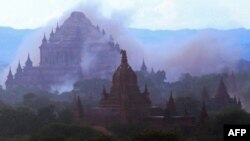 The ancient Sulamuni temple is seen shrouded in dust as a 6.8 magnitude earthquake hit Bagan, Myanmar, Aug. 24, 2016.