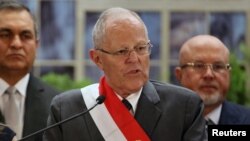 The body of a young man is seen covered with an emergency blanket after being recovered by Spanish police from waters near the border between Morocco and Spain&#39;s north African enclave of Ceuta.