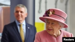 Britain's Queen Elizabeth speaks at the Defense Science and Technology Laboratory at Porton Science Park near Salisbury, Britain, Oct. 15, 2020. 