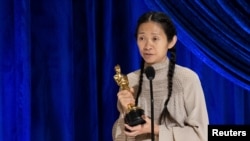 Chloe Zhao accepts the Oscar for Directing during the live ABC Telecast of The 93rd Oscars in Los Angeles, California, U.S., April 25, 2021.