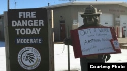 Sign posted outside of the Bureau of Indian Affairs Wildland Fire Management offices on the Rosebud Reservation, S.D., protesting government shutdown. Courtesy Lynne Columbe