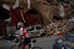 بیروت کی بندرگاہ پر ہونے والے طاقت ور دھماکے سے تباہی کا ایک منظر۔ 11 اگست 2020